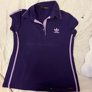 I’m selling a purple, neck shirt for sports from the brand adidas.